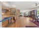 Spacious condo features a gourmet kitchen, dining area, and large living room with hardwood floors at 151 N Orlando Ave # 212, Winter Park, FL 32789