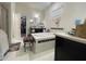 Luxurious main bathroom featuring a deep soaking tub, separate shower, and ample counter space at 16611 Toccoa Row, Winter Garden, FL 34787