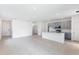 Spacious living room featuring tile floors, recessed lighting and an open layout, great for entertaining at 176 Duckweed Ave, Fruitland Park, FL 34731