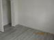 Bedroom showcasing a closet and fresh, neutral paint to suit any decor style at 2002 Cascades Blvd # 201, Kissimmee, FL 34741