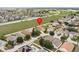 Wide aerial perspective showcasing the home's location, neighboring houses, and the surrounding community at 204 Cotswold Cir, Davenport, FL 33837