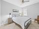 Cozy bedroom with a comfortable bed, soft bedding, and a ceiling fan for added comfort at 204 Cotswold Cir, Davenport, FL 33837