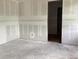 Unfinished room features an doorway, taped drywall ready for paint and flooring at 2379 Broadbrook Drive, St Cloud, FL 34771