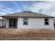 Exterior elevation of a home showing the back porch and backyard at 2379 Broadbrook Drive, St Cloud, FL 34771