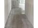 Unfinished interior showcasing smooth concrete floors and drywall at 2379 Broadbrook Drive, St Cloud, FL 34771