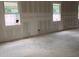 Spacious room featuring drywall and two windows at 2379 Broadbrook Drive, St Cloud, FL 34771