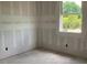 Unfinished room boasting a bright window and electrical outlets at 2379 Broadbrook Drive, St Cloud, FL 34771