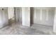 Spacious, unfinished room with drywall and concrete flooring at 2379 Broadbrook Drive, St Cloud, FL 34771
