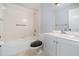 Bathroom featuring tile floor, vanity, mirror, and shower/tub combo at 300 Carolina Ave # 205, Winter Park, FL 32789