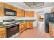 Well-lit kitchen offering ample counter space and modern appliances at 300 Carolina Ave # 205, Winter Park, FL 32789