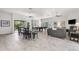 Spacious recreation room featuring neutral decor, travertine flooring, a pool table, dining area and comfortable seating at 300 Carolina Ave # 205, Winter Park, FL 32789