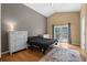 Bright main bedroom boasts high ceilings and French doors to the exterior at 30926 County Road 435, Sorrento, FL 32776
