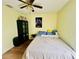 Bedroom featuring laminate floors, a ceiling fan, and a closet at 318 Langham Dr, Davenport, FL 33897