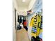 Spacious walk-in closet provides ample storage space with shelves, hanging rods, and room for organizing personal items at 318 Langham Dr, Davenport, FL 33897