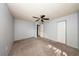 Comfortable bedroom includes a ceiling fan and generous closet space for easy organization and storage at 3748 Idlebrook Cir # 202, Casselberry, FL 32707