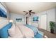 Staged bedroom with ceiling fan offers a tranquil retreat with stylish furnishings and natural light at 3748 Idlebrook Cir # 202, Casselberry, FL 32707