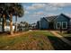 Well-maintained community grounds featuring lush green spaces and beautiful landscaping around the building at 3748 Idlebrook Cir # 202, Casselberry, FL 32707