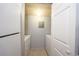 Convenient laundry room provides essential appliances and storage space, streamlining household tasks at 3748 Idlebrook Cir # 202, Casselberry, FL 32707