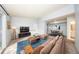 Staged living room featuring stylish furniture and decor, creating a welcoming and inviting space at 3748 Idlebrook Cir # 202, Casselberry, FL 32707