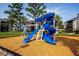 A bright and inviting playground with a slide, swings, and other play equipment on a cushioned ground at 3748 Idlebrook Cir # 202, Casselberry, FL 32707