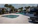 Relaxing pool area featuring comfortable lounge chairs, perfect for unwinding under the sun at 3748 Idlebrook Cir # 202, Casselberry, FL 32707