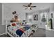 ' bedroom featuring twin beds, themed decor, and a cozy, playful atmosphere at 391 Cabello Dr, Davenport, FL 33837