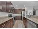 Modern kitchen with stainless steel appliances and granite countertops at 391 Cabello Dr, Davenport, FL 33837