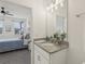 Bathroom vanity and bedroom combination at 394 Quayside Ave, Mascotte, FL 34753