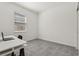 Bedroom with a laptop desk and window at 394 Quayside Ave, Mascotte, FL 34753