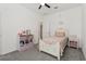 Adorable bedroom with matching bed set and decor at 394 Quayside Ave, Mascotte, FL 34753