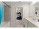 A modern bathroom that looks into a bedroom at 3941 Willowbrook Dr, Edgewater, FL 32141