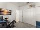 Secondary bedroom with carpet, closet, and gamer decor at 3941 Willowbrook Dr, Edgewater, FL 32141