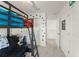 View of bunk bed, closet, and bedroom entrance at 3941 Willowbrook Dr, Edgewater, FL 32141