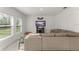 Comfortable living room with a large sectional couch, TV, and neutral decor at 3941 Willowbrook Dr, Edgewater, FL 32141