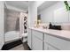 Stylish bathroom featuring modern vanity, sleek fixtures, and a shower-tub combo, combining elegance and functionality at 3977 Willowbrook Dr, Edgewater, FL 32141