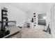 Bright bedroom with a vanity, carpeted floors, and shelves, perfect for a comfortable and organized space at 3977 Willowbrook Dr, Edgewater, FL 32141