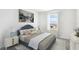 Cozy bedroom featuring natural light and neutral decor, creating a relaxing atmosphere at 4129 Lavender Ct, Lake Hamilton, FL 33851
