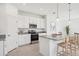 Modern kitchen with stainless steel appliances, granite countertops, and ample cabinet space at 4129 Lavender Ct, Lake Hamilton, FL 33851