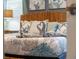 Bedroom with starfish-themed pillows and swan towel arrangement on the bed at 424 Ocean Course Ave, Davenport, FL 33896