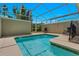A screened-in swimming pool surrounded by a deck with lounge chairs at 424 Ocean Course Ave, Davenport, FL 33896