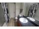Cozy bathroom featuring tile floor, updated vanity and a shower and tub combo at 445 Fountainhead Cir # 262, Kissimmee, FL 34741