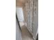 Bathroom with patterned shower curtain and beige tile flooring at 445 Fountainhead Cir # 262, Kissimmee, FL 34741