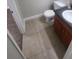 Bathroom featuring wood-look vanity and tiled floors at 445 Fountainhead Cir # 262, Kissimmee, FL 34741