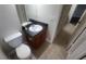 Cozy bathroom with a modern vanity and toilet at 445 Fountainhead Cir # 262, Kissimmee, FL 34741