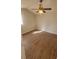 Bedroom features hardwood floors, neutral paint and a ceiling fan for comfortable living at 445 Fountainhead Cir # 262, Kissimmee, FL 34741