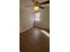 Cozy bedroom with ceiling fan, neutral paint, window and modern flooring throughout at 445 Fountainhead Cir # 262, Kissimmee, FL 34741