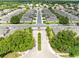 Aerial view of a residential community with manicured landscaping and tree-lined streets at 449 Cruz Bay Cir, Winter Springs, FL 32708