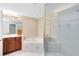 Bathroom with tile flooring, bathtub and glass enclosed shower at 449 Cruz Bay Cir, Winter Springs, FL 32708