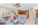 Cozy living room area with tile floors, warm colors and a decorative Florida accent at 449 Cruz Bay Cir, Winter Springs, FL 32708