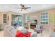 Comfortable living room with sliding glass doors and view of the outdoor space at 449 Cruz Bay Cir, Winter Springs, FL 32708